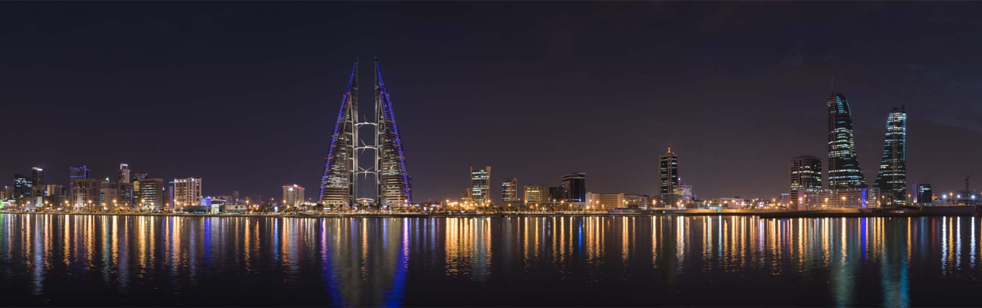 The Manama skyline lit up at night